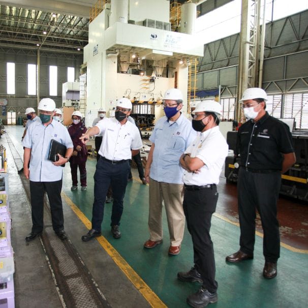 The delegation walking the press shop floor at Miyazu (M) Sdn Bhd